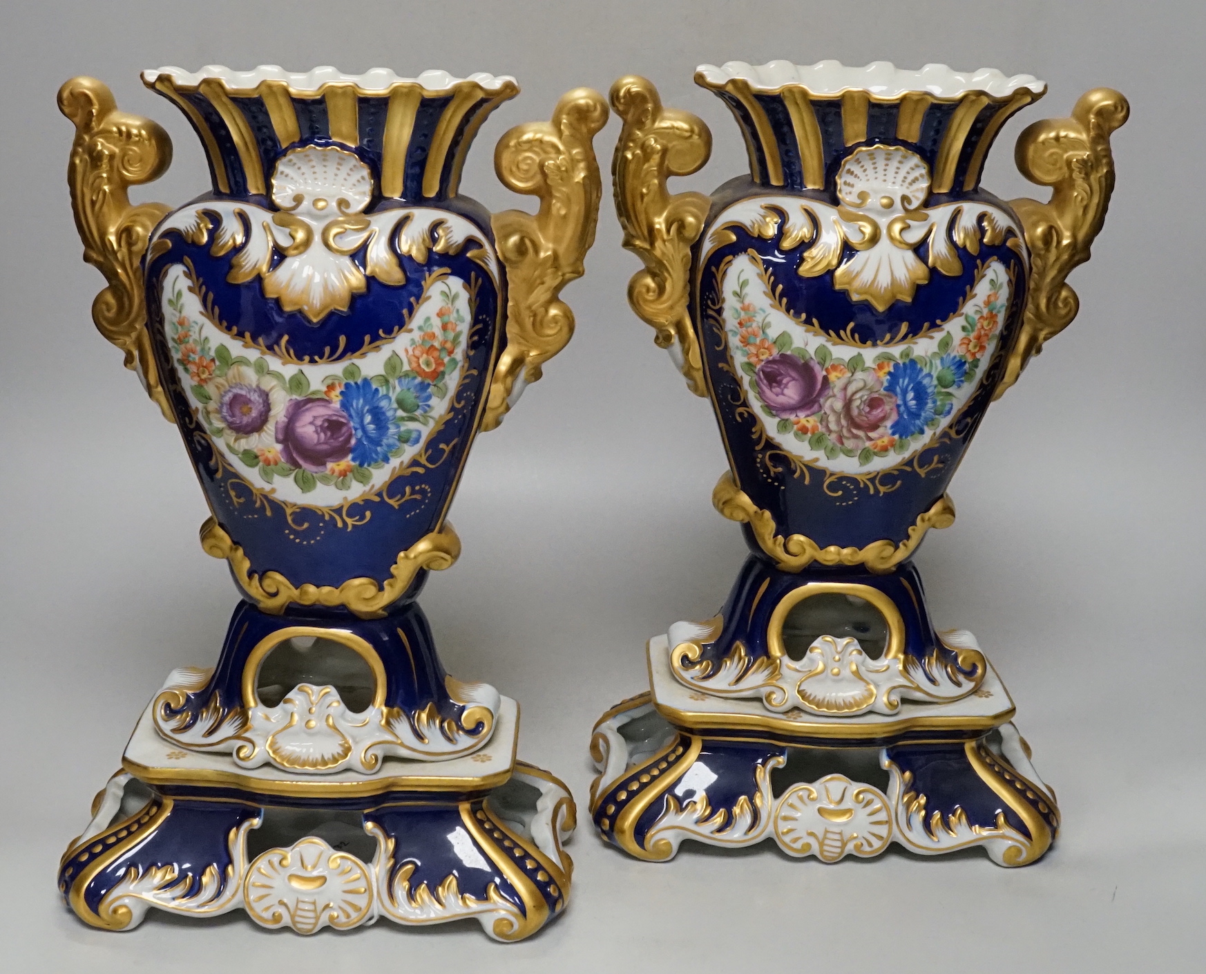 A pair of Sevres style porcelain vases, 31.5cm